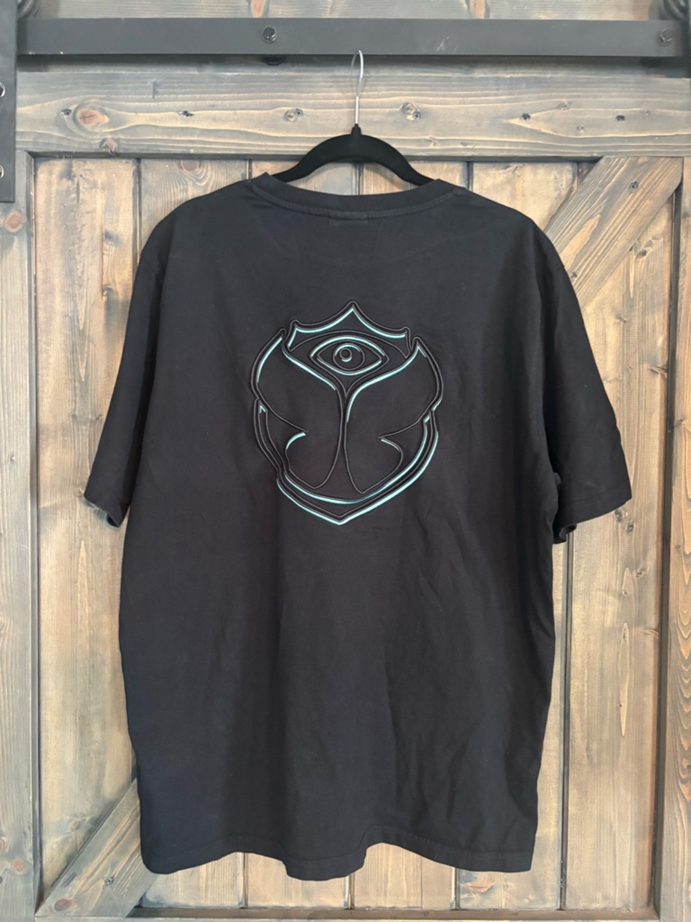TOMORROWLAND Black Short-Sleeve Tee with Teal Outline Emblem